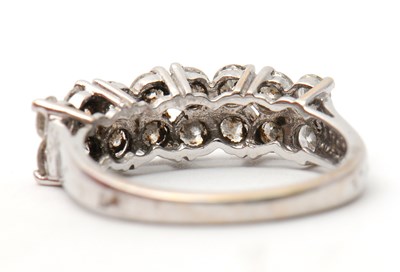 Lot 20 - An 18ct diamond ring, set with round brilliant...
