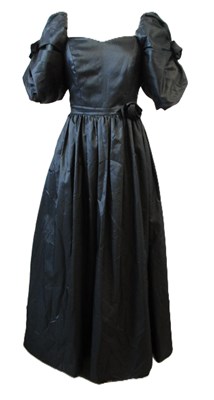 Lot 56 - John Charles: a 1980's black satin gown, with...