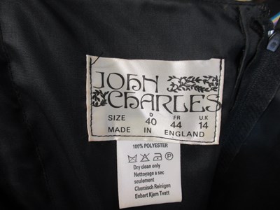 Lot 56 - John Charles: a 1980's black satin gown, with...