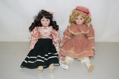 Lot 63 - Two porcelain headed dolls