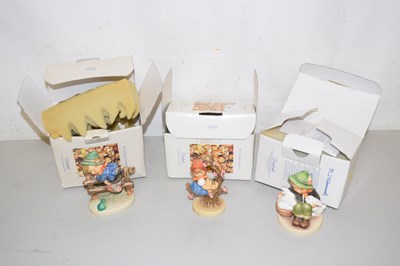 Lot 77 - Three boxed Hummel figures