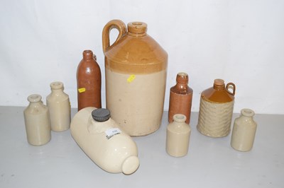 Lot 135 - An unbranded stone ware flagon together with a...