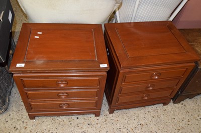 Lot 249 - Pair of Oriental hardwood three drawer bedside...