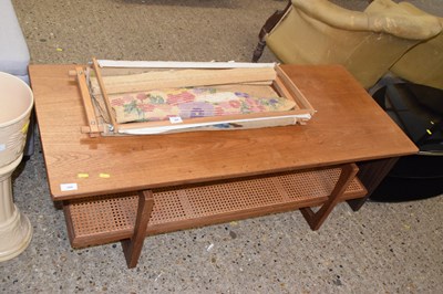 Lot 268 - A G-Plan coffee table with cane finish base shelf
