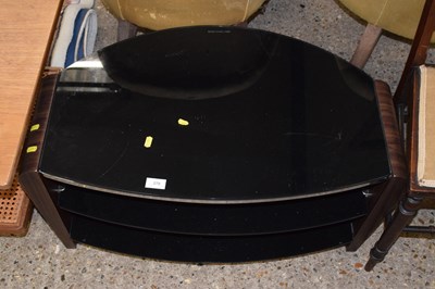 Lot 270 - A dark finish television cabinet