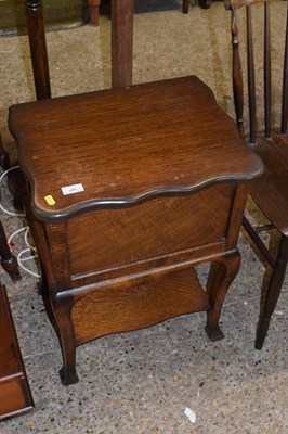 Lot 281 - A vintage combination oak sewing and games...