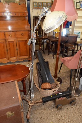 Lot 284 - A vintage metal floor standing adjustable lamp