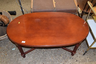 Lot 293 - An oval coffee table