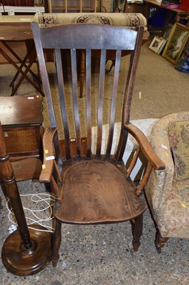 Lot 297 - An elm seated Windsor chair