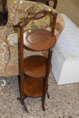 Lot 299 - An oak three tier cake stand