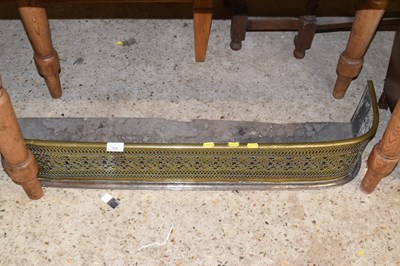 Lot 304 - A brass and steel fire fender