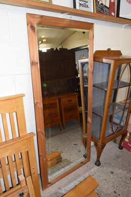 Lot 333 - A large modern pine framed wall mirror