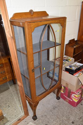 Lot 334 - An Edwardian oak framed china display cabinet