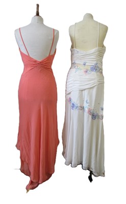 Lot 87 - Two dresses, including an apricot chiffon...