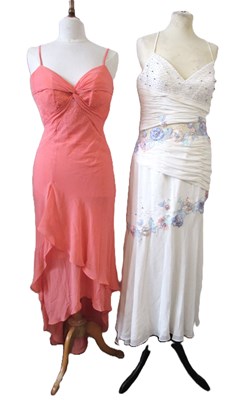 Lot 87 - Two dresses, including an apricot chiffon...