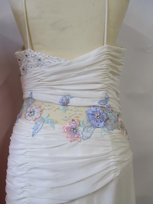 Lot 87 - Two dresses, including an apricot chiffon...