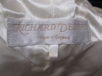 Lot 87 - Two dresses, including an apricot chiffon...