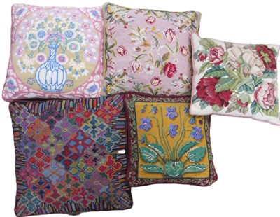 Lot 234 - Five needlepoint cushions, to include designs...