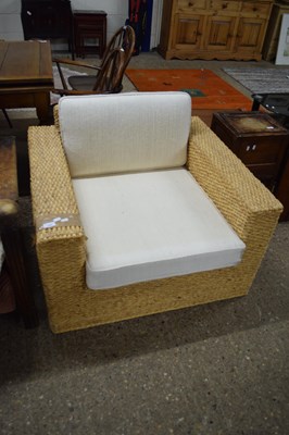 Lot 378 - MODERN RUSH FRAMED ARMCHAIR