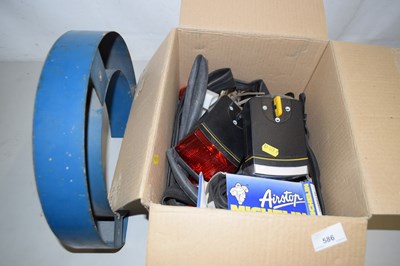 Lot 586 - A box of various cycle lights, inner tubes,...