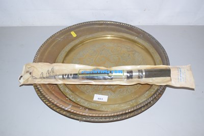 Lot 603 - Two brass wall chargers and a telescopic...