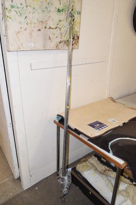 Lot 643 - A pair of chrome finish curtain rails with...