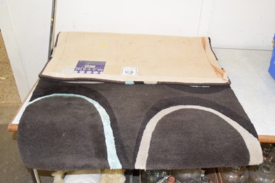 Lot 644 - A modern matrix floor rug