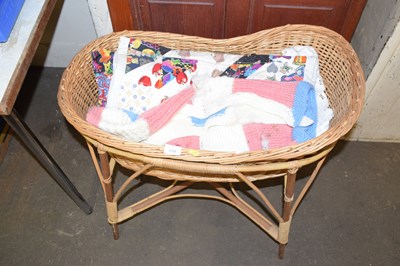 Lot 650 - A wicker baby cot