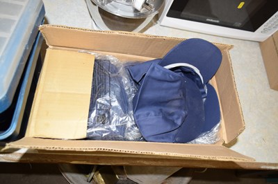 Lot 655 - A box of blue baseball caps