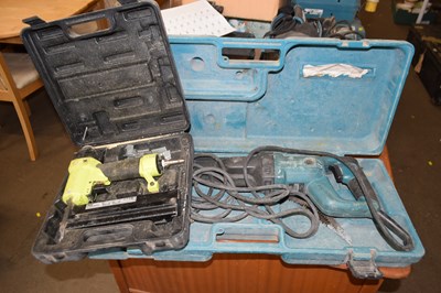 Lot 678 - A Makita JR3050T electric saw, 110v together...