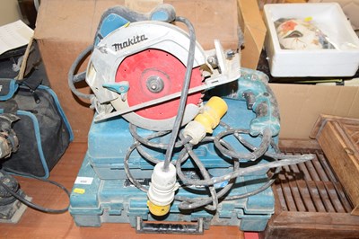 Lot 680 - A Makita 110v circular saw together with a...