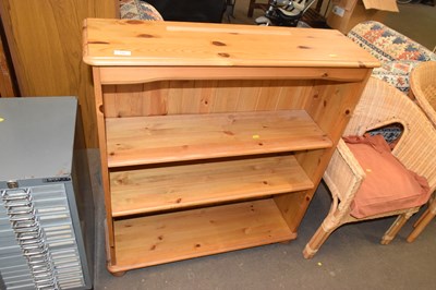 Lot 709 - A pine bookcase cabinet