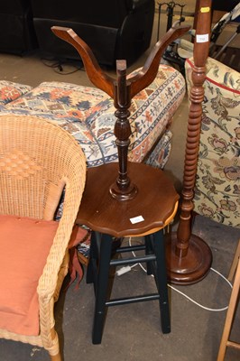 Lot 711 - A leather topped wine table together with a...