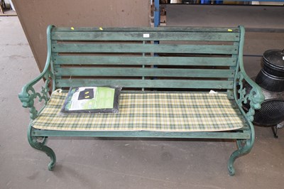 Lot 725 - An iron framed garden bench and cover