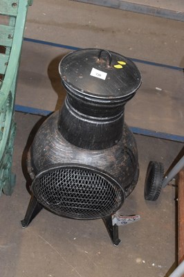 Lot 726 - An iron chiminea