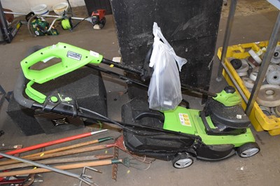Lot 729 - An electric lawnmower and strimmer