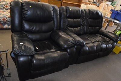Lot 735 - A leather two seater recliner sofa and...