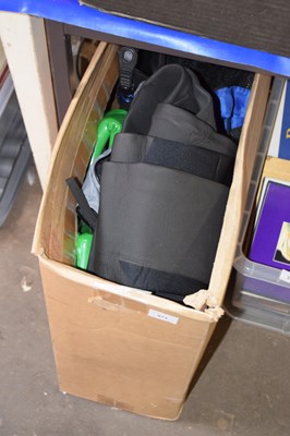 Lot 571 - A box of various wetsuits, flippers etc