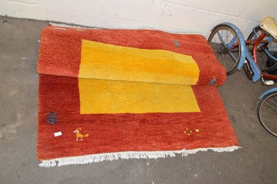 Lot 772 - Modern red and yellow floor rug