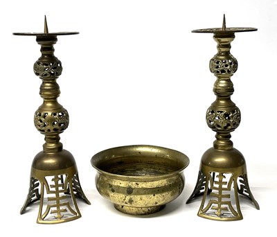 Lot 221 - A pair of Chinese brass candlesticks together...