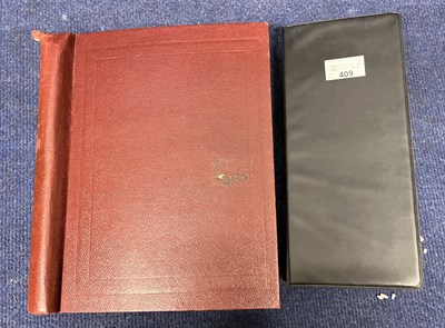 Lot 409 - An album containing as new booklets of modern...