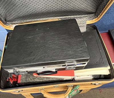 Lot 410 - A suitcase containing an accumulation of...