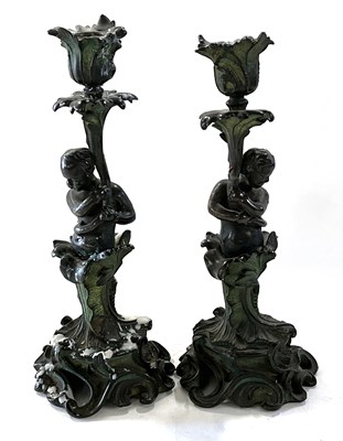 Lot 418 - A pair of continental formerly gilt bronze...