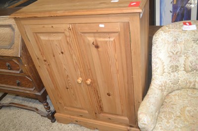 Lot 237 - Modern waxed pine twin-door Cupboard