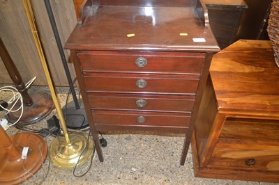 Lot 254 - Small four-drawer Music Cabilnet