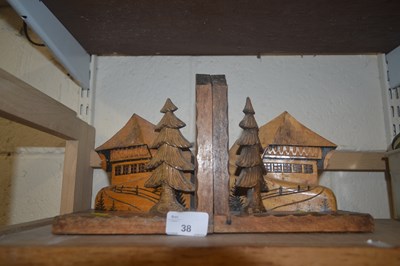 Lot 38 - Two wooden bookends with carved alpine cottages