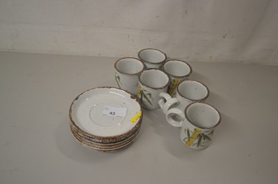 Lot 43 - Group of Mid winter pottery cups and saucers