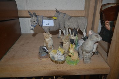 Lot 49 - Two mdels of donkeys and other smaller models...