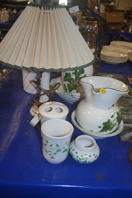 Lot 106 - A metal wine rack, other ceramics, bowls, jugs...