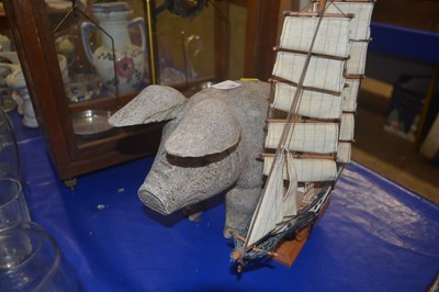 Lot 138 - Pottery model of a pig, and a model of a ship